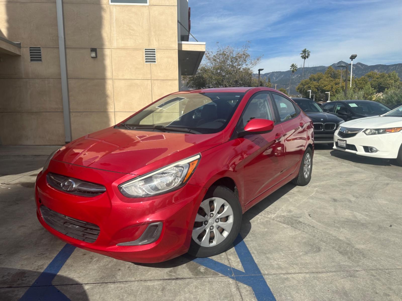 2015 Red /Gray Hyundai Accent GLS Sedan 4D (KMHCT4AE2FU) with an 4-Cyl, 1.6L engine, Auto, 6-Spd w/Overdrive transmission, located at 30 S. Berkeley Avenue, Pasadena, CA, 91107, (626) 248-7567, 34.145447, -118.109398 - The 2015 Hyundai Accent 4-Door Sedan stands as a testament to Hyundai's commitment to quality, efficiency, and value. Located in Pasadena, CA, our dealership specializes in providing a wide range of used BHPH (Buy Here Pay Here) cars, trucks, SUVs, and vans, including the remarkable Hyundai Accent. - Photo #1